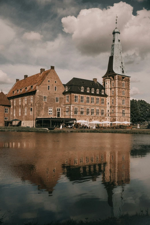 two large buildings in the middle of the water