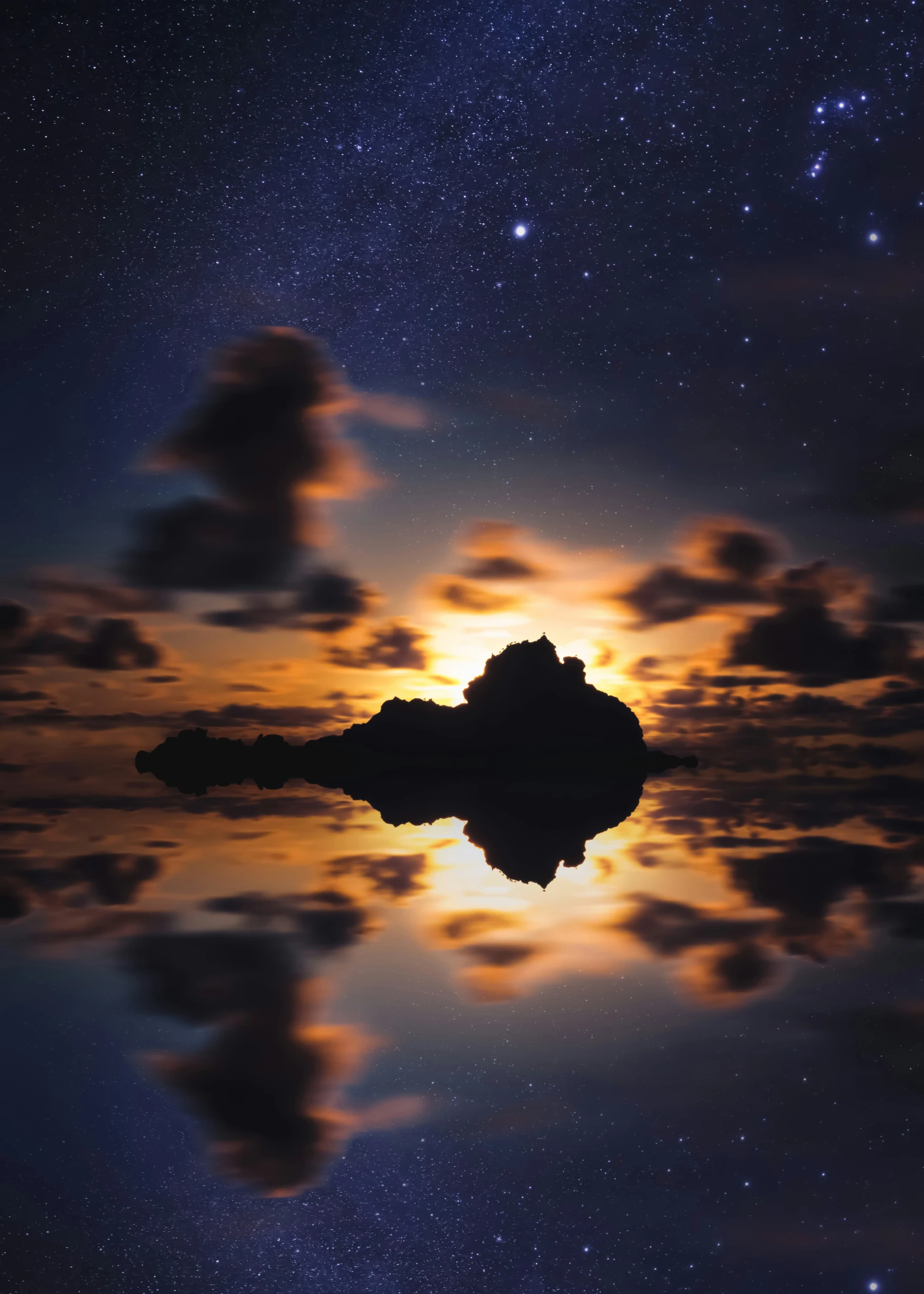 the moon is seen shining over the water at night