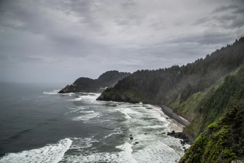 ocean view looking down at steep hillside and shore