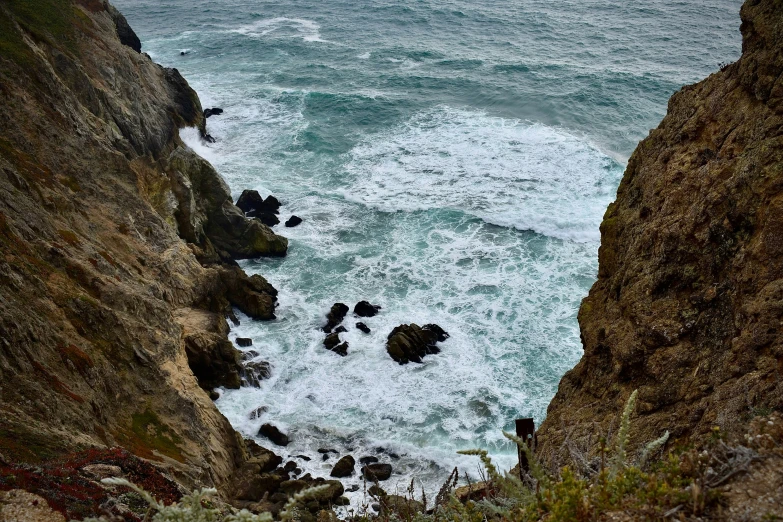 the view of the ocean from high up on the cliffs