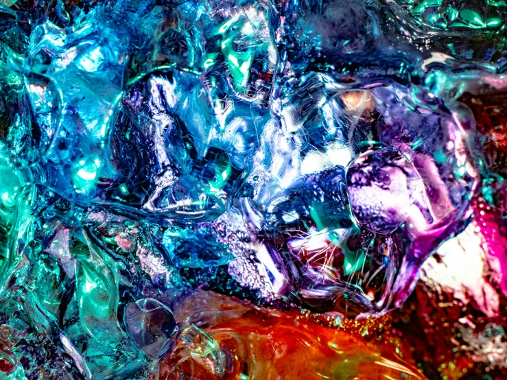 closeup of ice with various colors and patterns