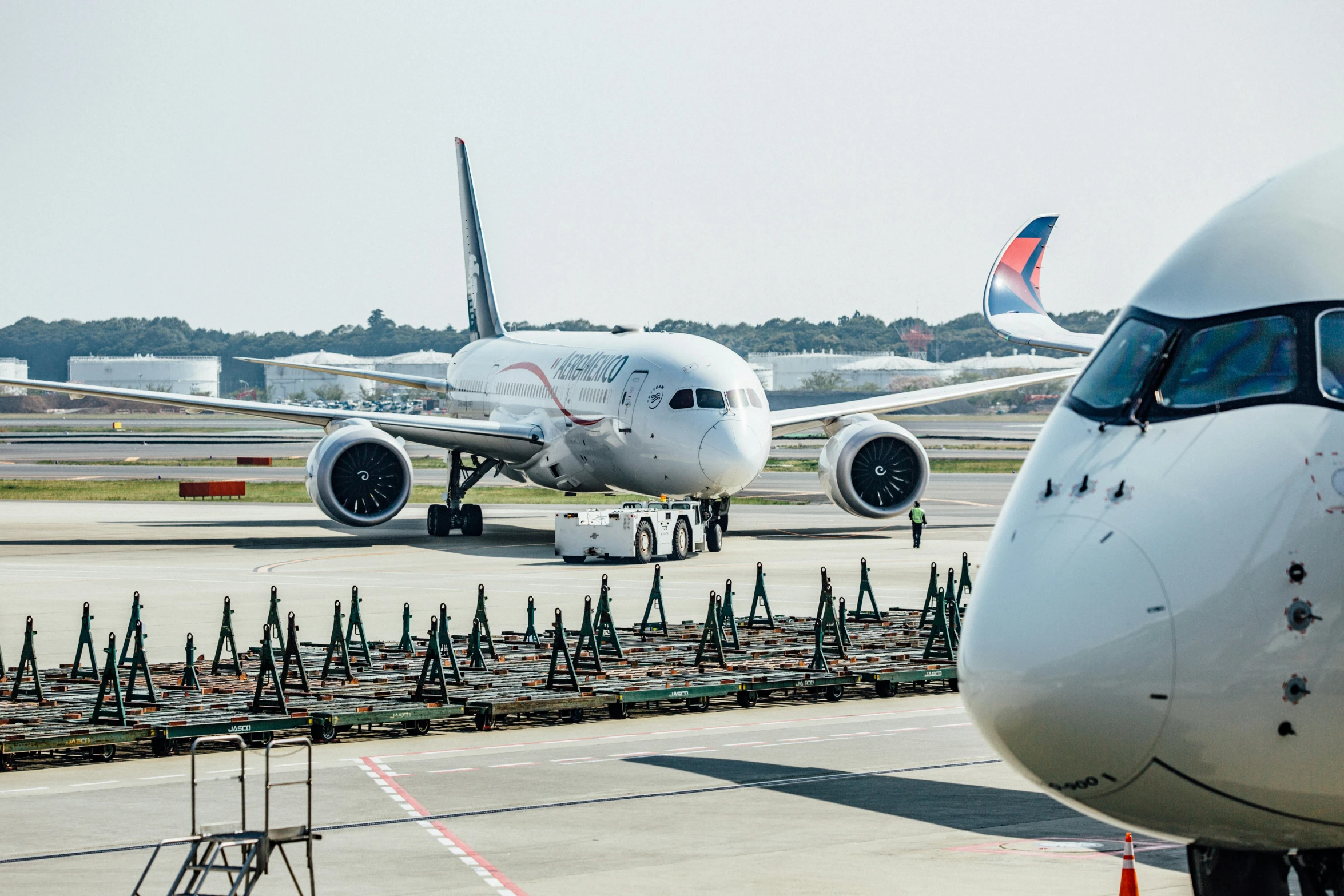 an airplane parked at the airport gate for check in