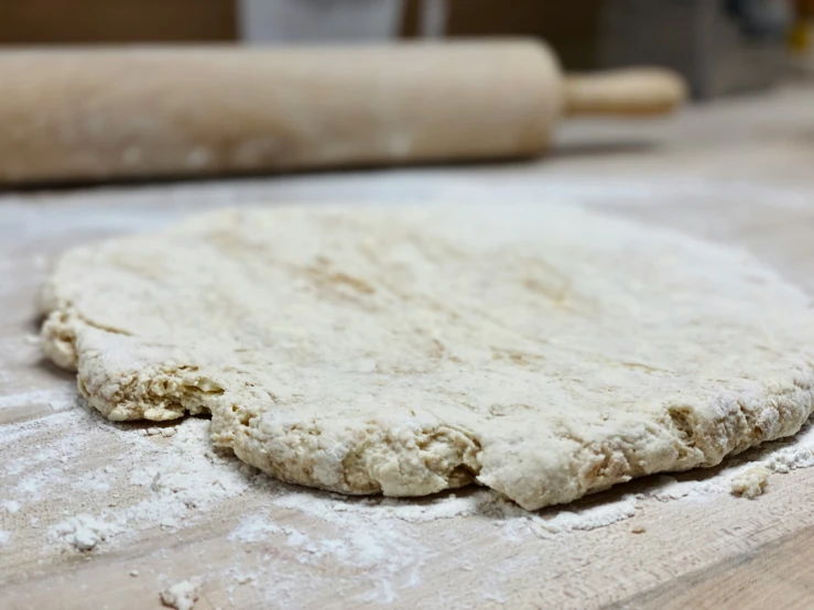 a uncooked cookie dough is lying on the table