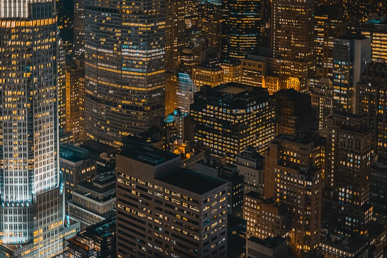 looking down at a large cityscape lit up in the night