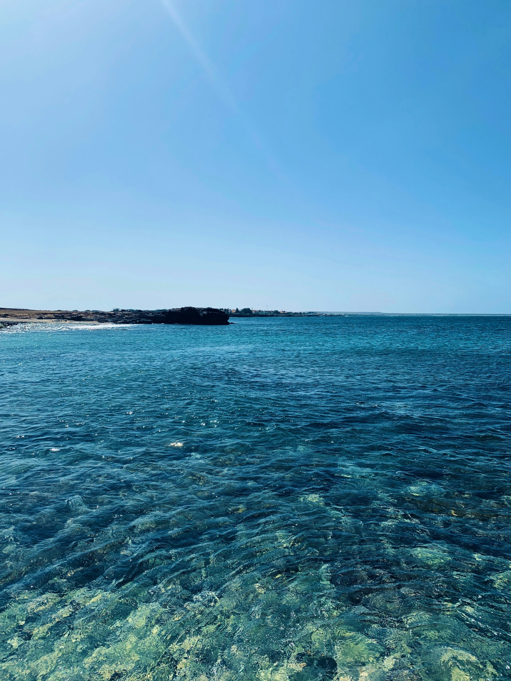 a body of water that has clear blue water