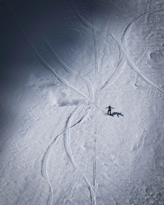 an aerial view of the slope in a ski resort