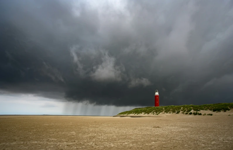 the sky and ground are covered by dark clouds