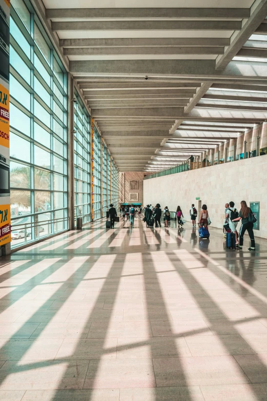 this is people walking in a long hallway