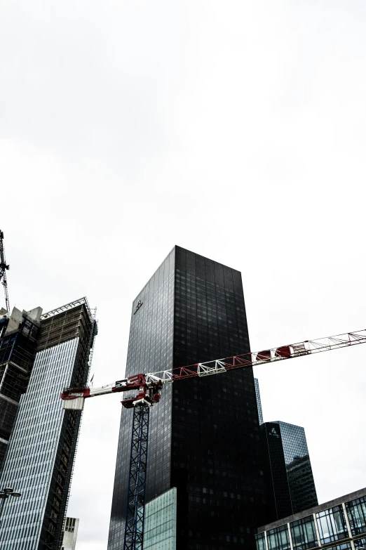 very tall building that is very modern and glass