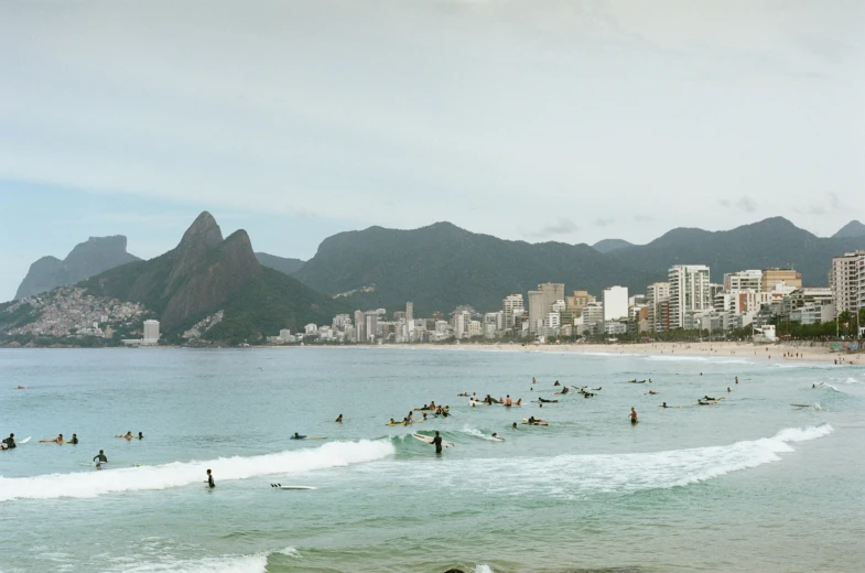 people are at the beach and they are enjoying the water