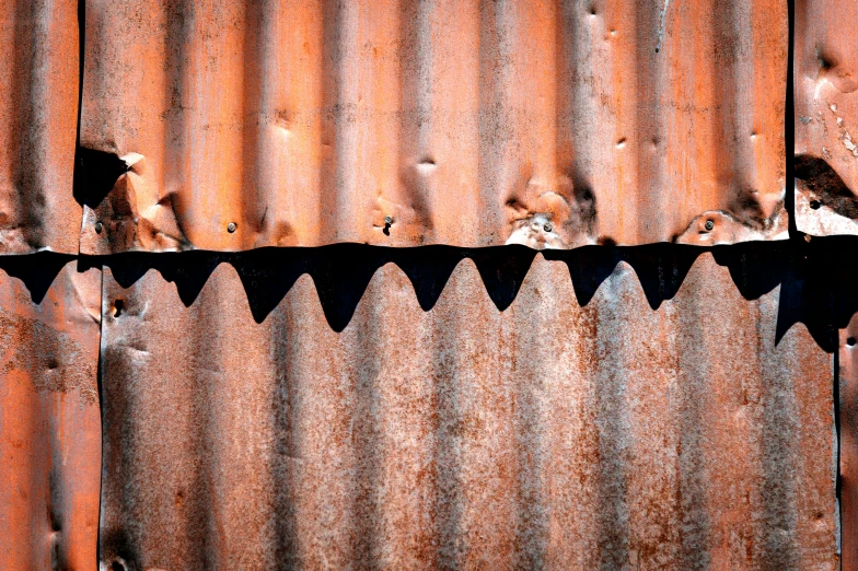 this image shows the pattern of rust on a metal roof