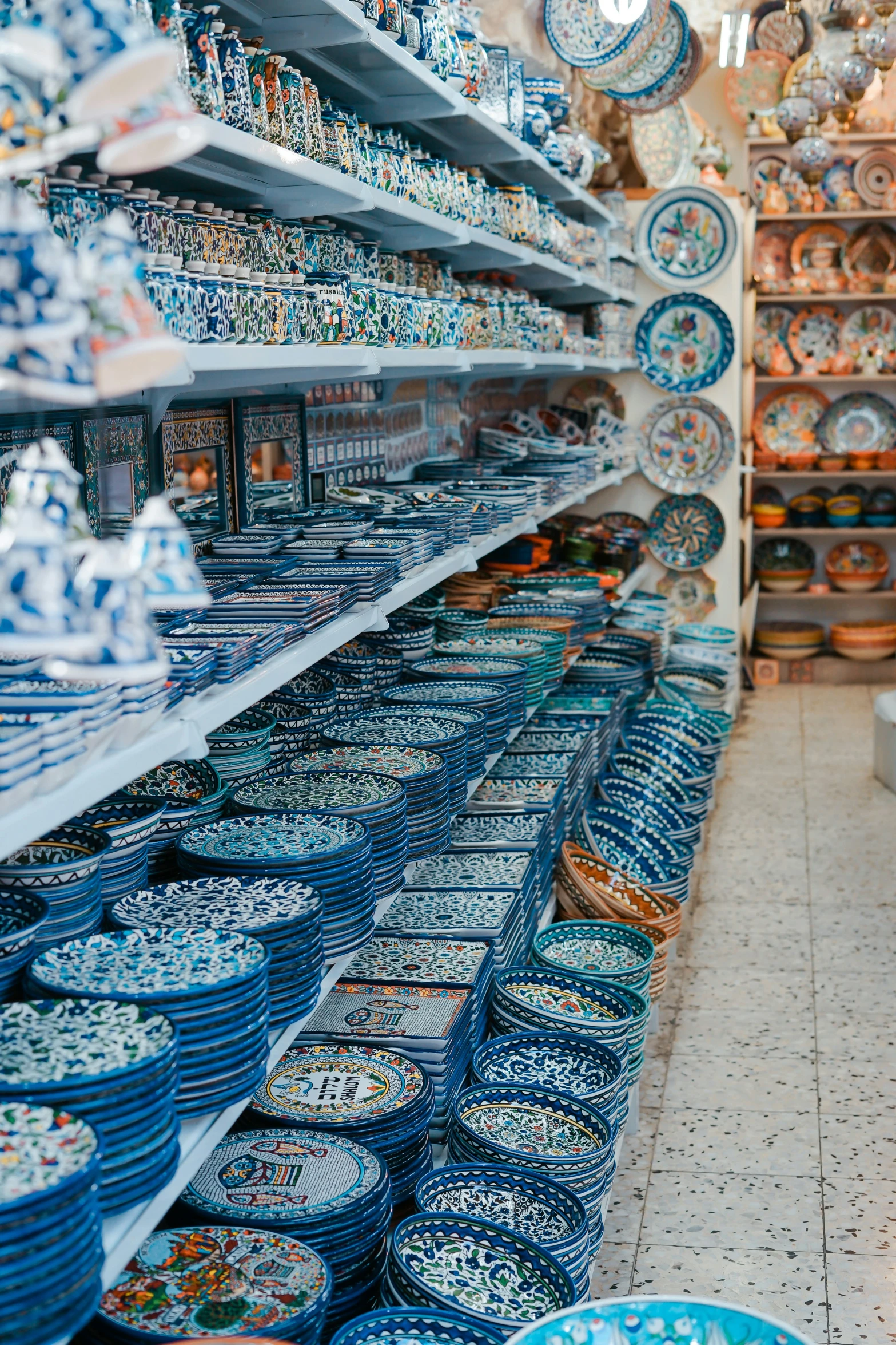 a large collection of blue and white dishes