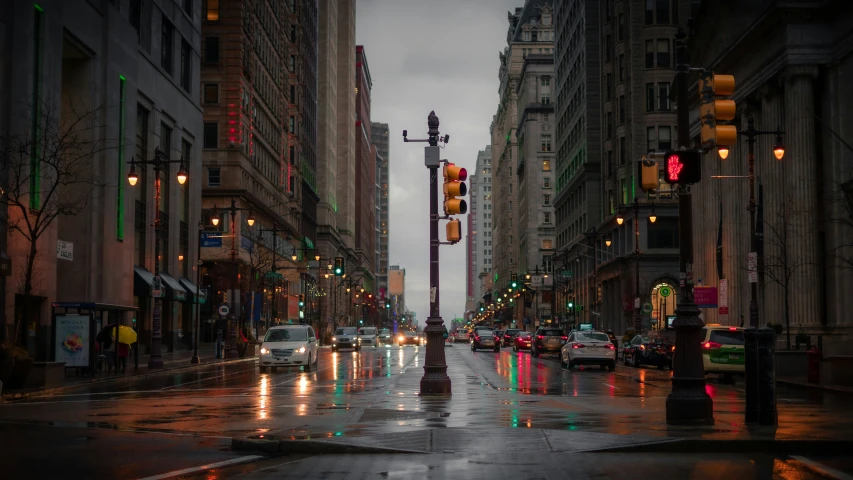 a wet city street on a gloomy day