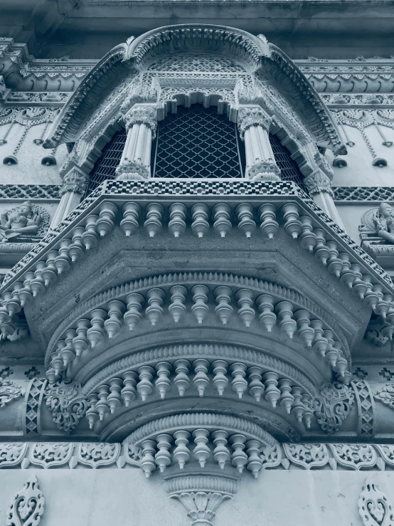 an ornate building with decorative carvings on the outside