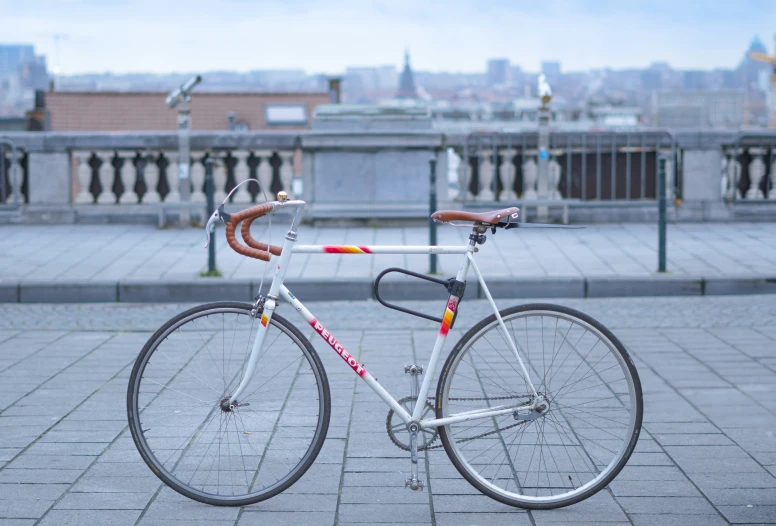 the bicycle is parked in the parking lot