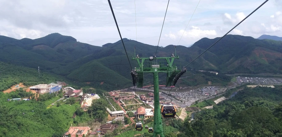 there is a view of mountains from the ski lift