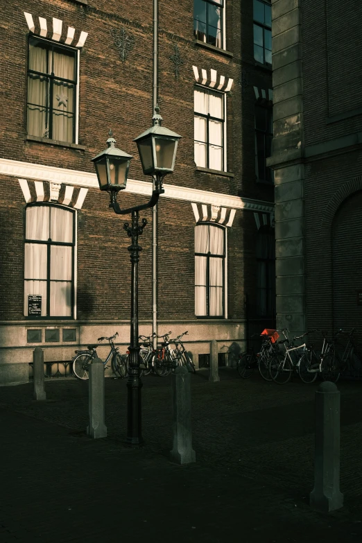 a bicycle stand with bicycle parked in front