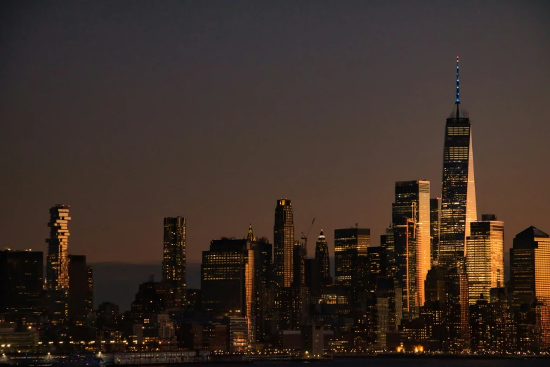 a nighttime skyline po with lights lit up