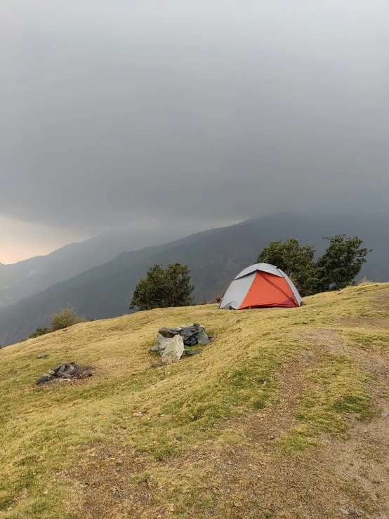 the tent is pitched up on a hill