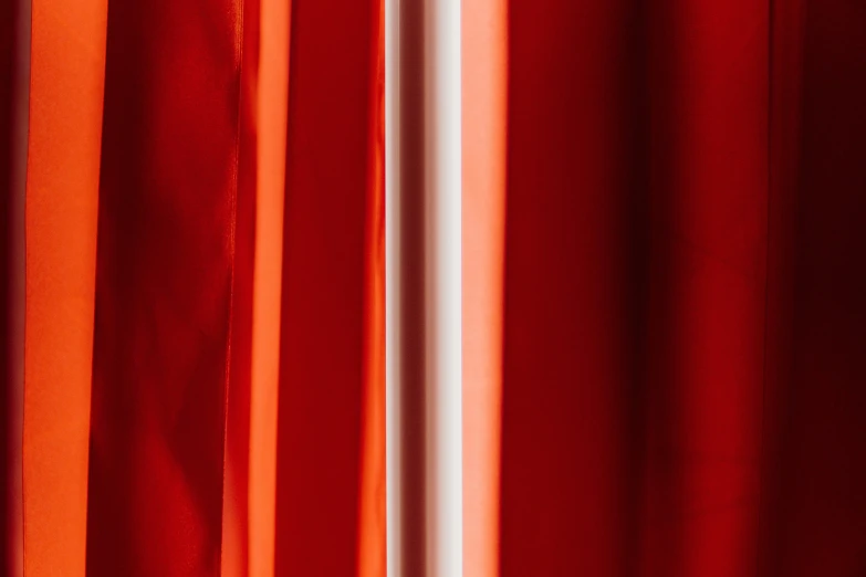 red curtains with orange and white stripes and red curtains