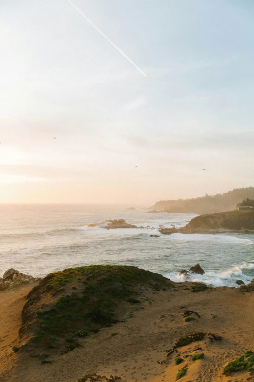 the ocean on a sunny day with waves coming