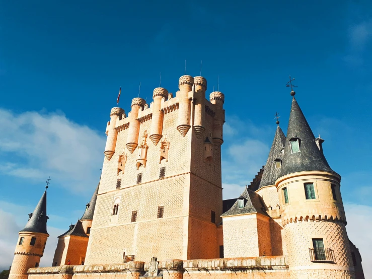 large old castle with turrets on the side