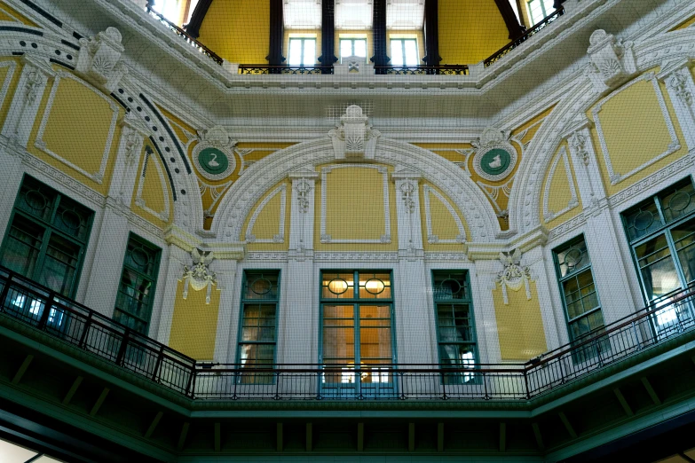 a large building with multiple windows and circular floor