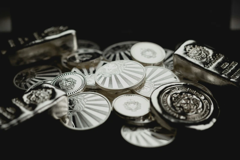 a pile of metal ons sitting on top of a table