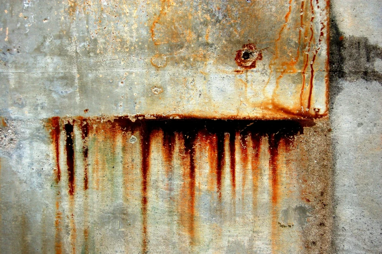 a wall that has rust on it
