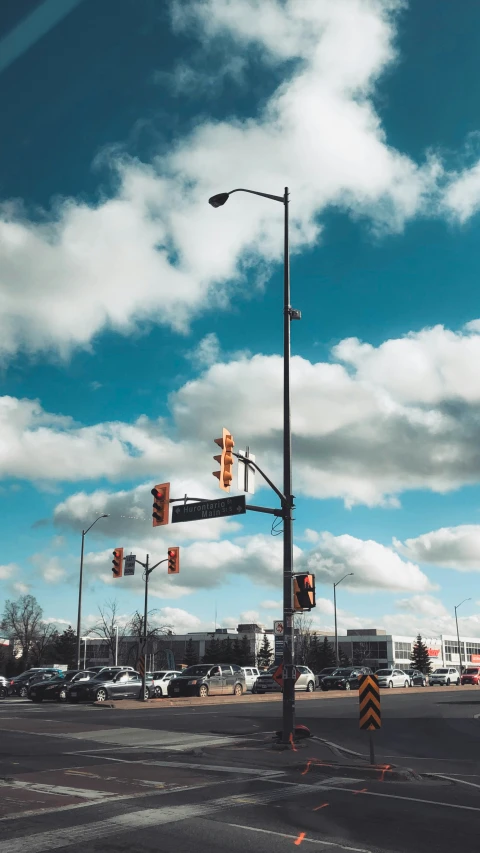 a street intersection with multiple traffic lights