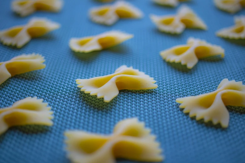 some uncooked and made shells are being displayed