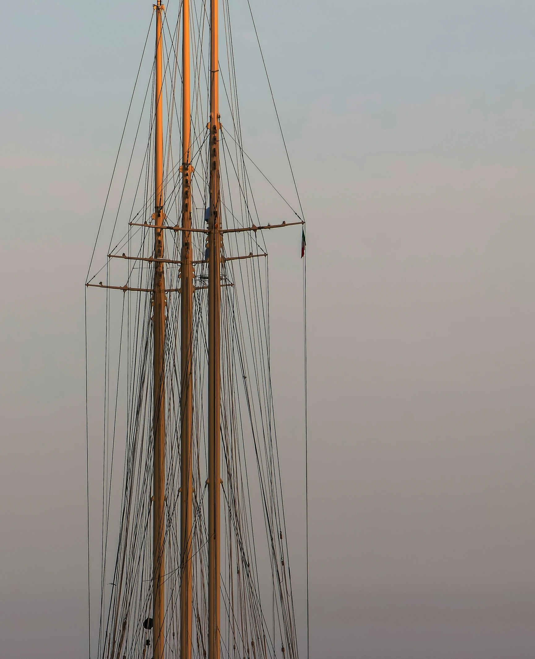 an old fashioned wooden and wire sail boat