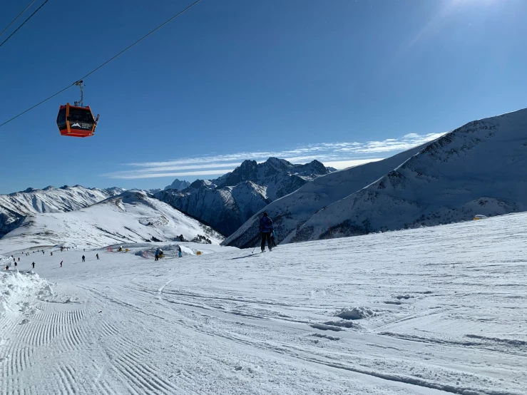 a skier is skiing near the ski lift in the snow