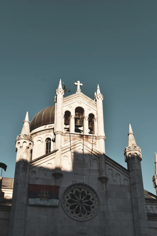 this is the image of a church that has a clock on it