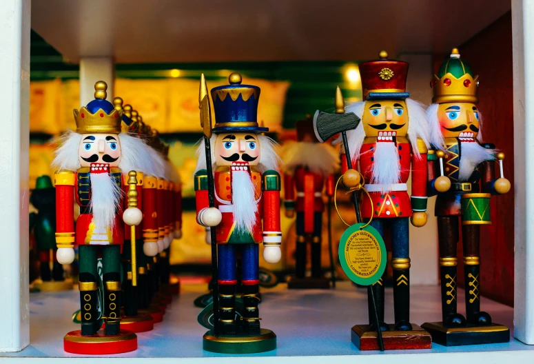 a number of toy figurines of people in colorful uniforms