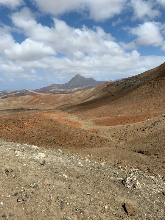 an open area of barren hills and sp soil