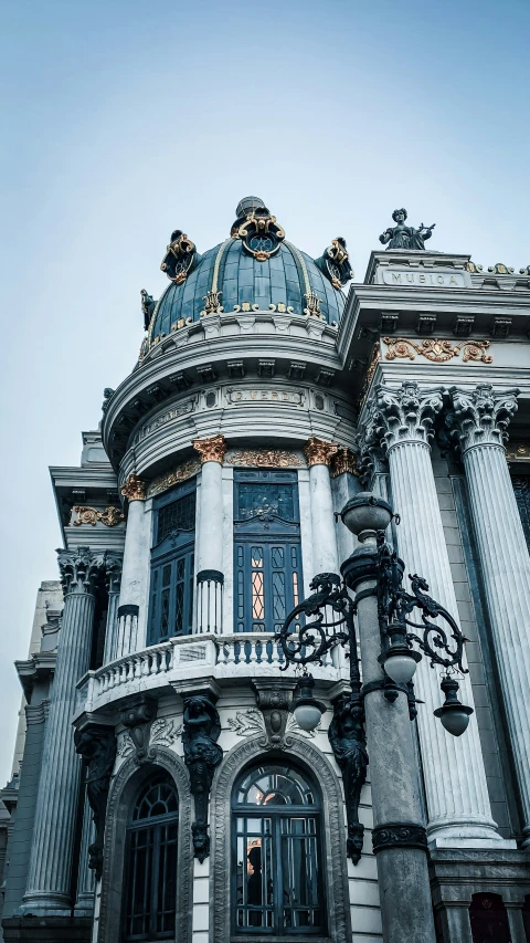 a close up of a large building with a clock tower on it