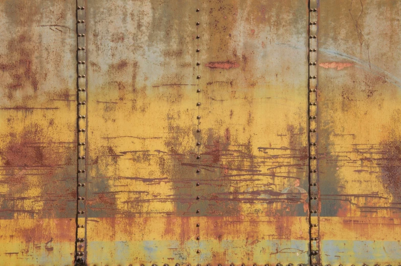 the rust on the side of a rusty metal structure