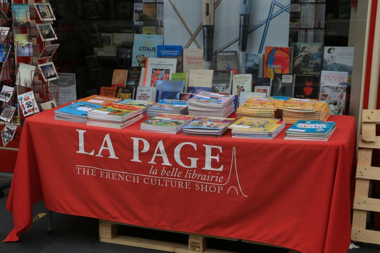 a bunch of books are on display for sale