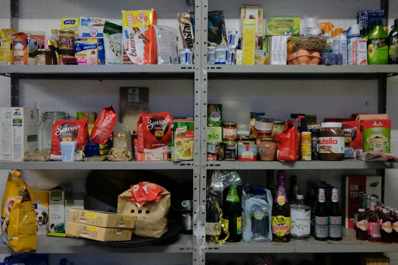 the shelves are filled with various items that can be found in the grocery