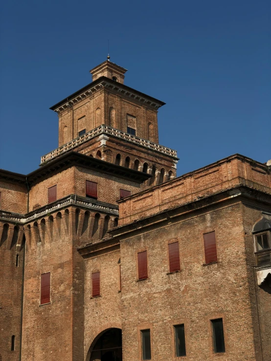 a tower on the side of a building with a clock