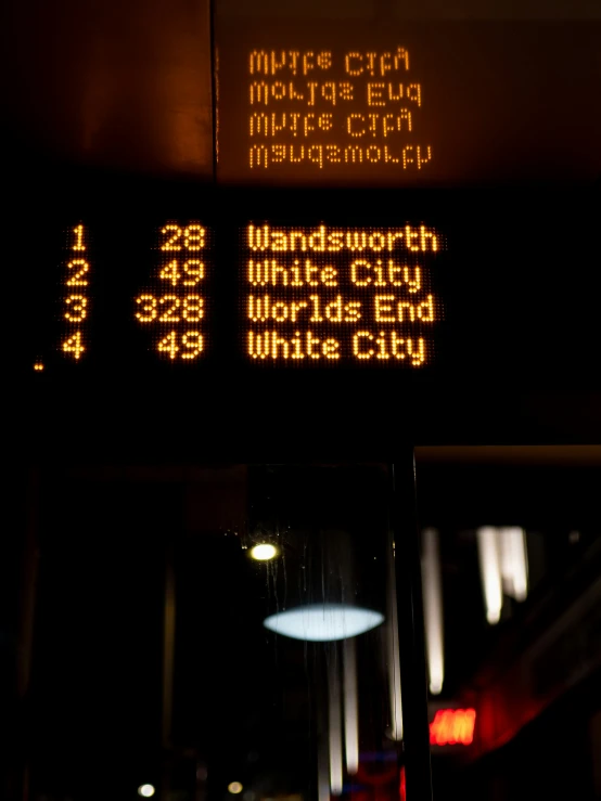 an information sign displays the time on which cities are available