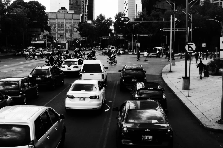 a bunch of cars that are in the road