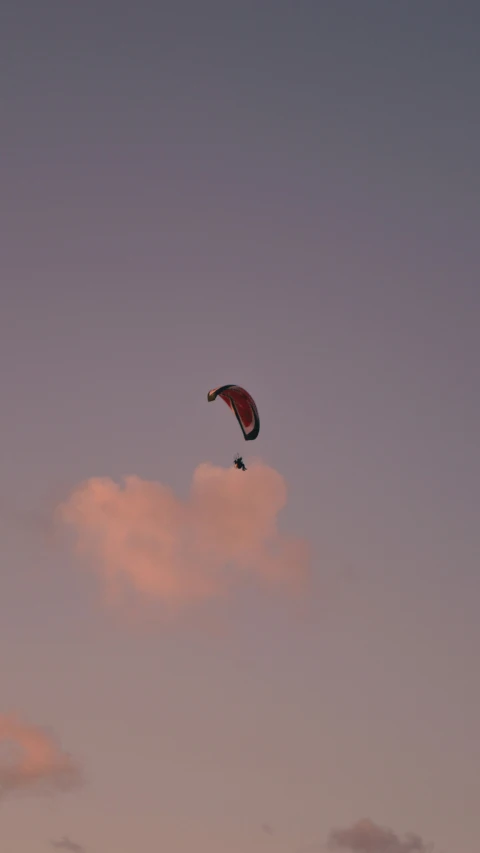 a kite is flying in the clear sky