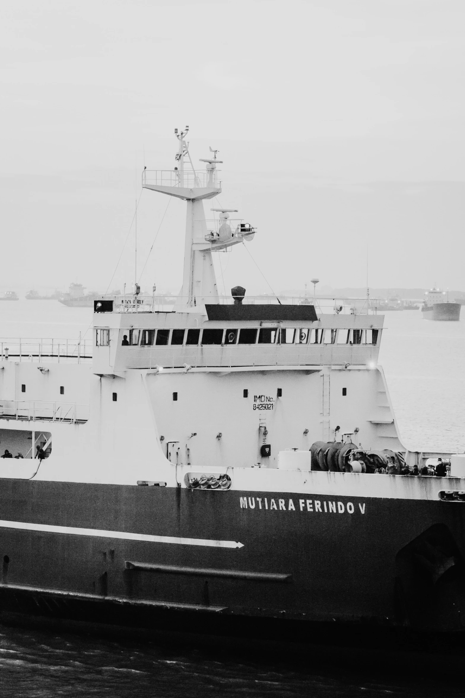 a black and white po of a small ship