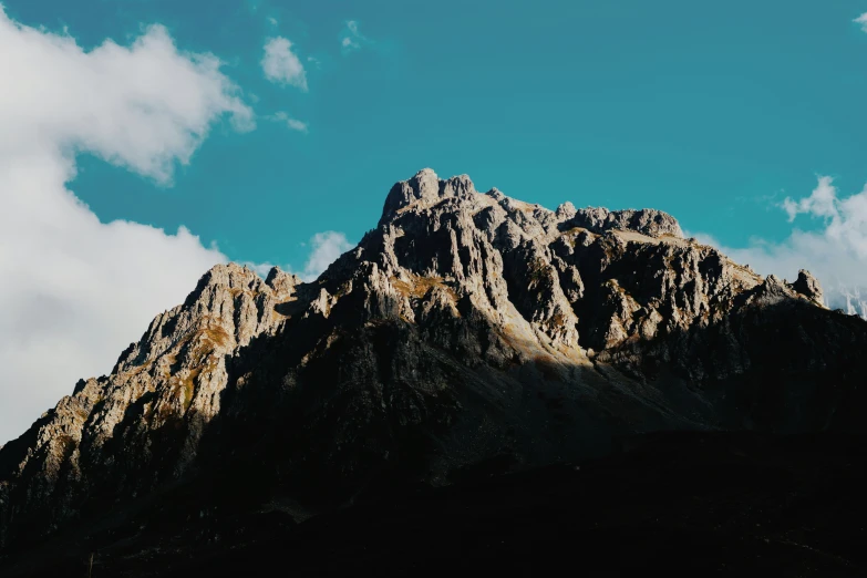 a close up of the top of a tall mountain