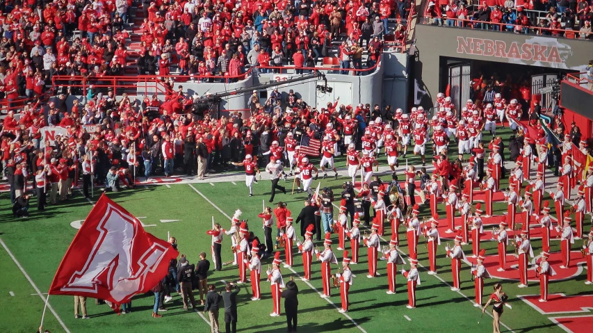 a stadium filled with lots of red and white fans