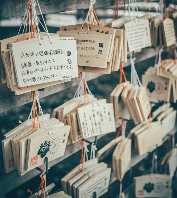 there are many wood boxes in the shape of signs