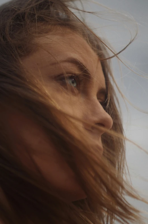 this image is of a woman with long hair