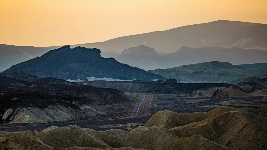 some very tall mountains near the desert